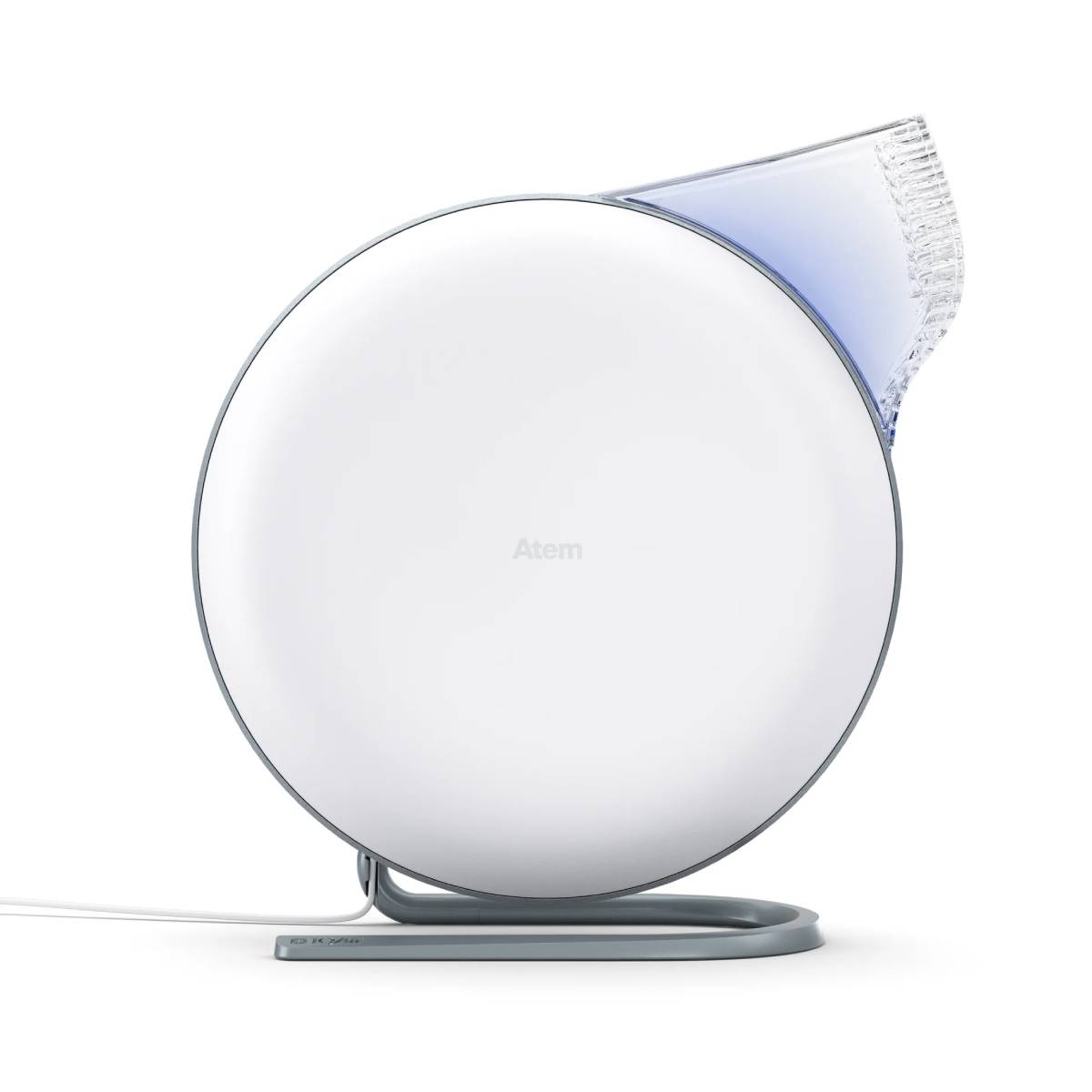 A sleek, modern Atem air purifier in white with a transparent blue top, mounted on a gray stand, showcasing minimalist design.