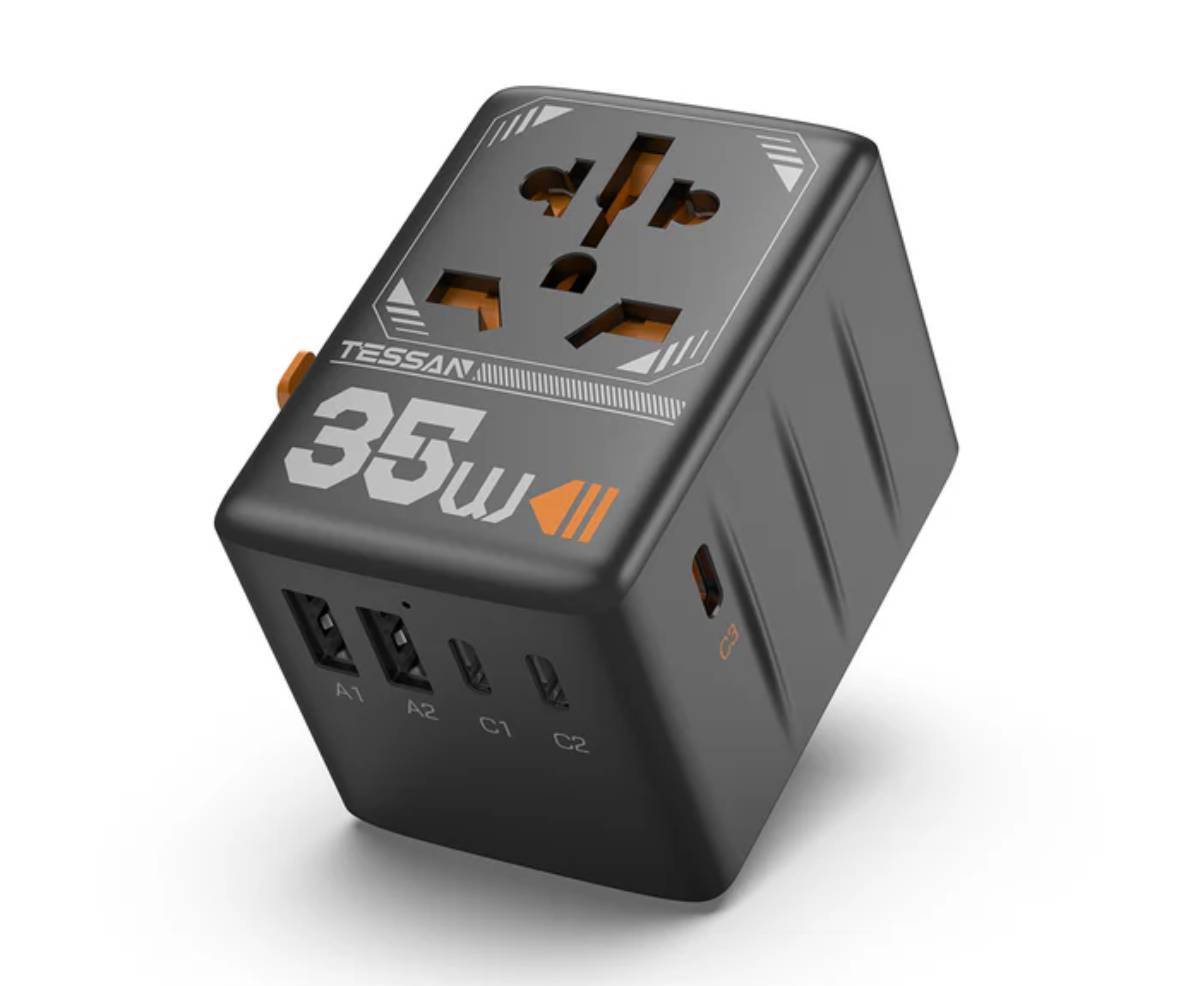 Black multi-port charger with four USB ports and a standard outlet, labeled 35W, featuring a compact design for travel.